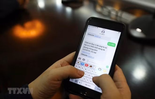新冠肺炎疫情：手机短信捐赠平台1407捐款超过1260亿越盾 ảnh 1