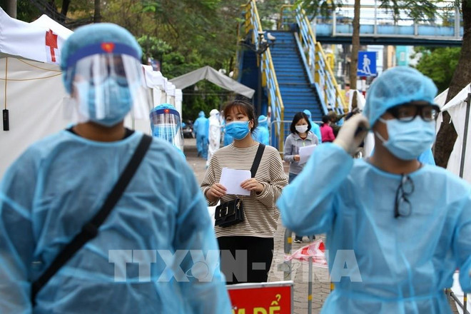 外国媒体高度评价越南新冠肺炎疫情防控工作取得的积极成效 ảnh 1 外国媒体高度评价越南新冠肺炎疫情防控工作取得的积极成效 ảnh 1