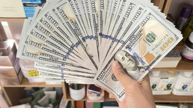 4月11日上午美元和人民币汇率有所下降 ảnh 1