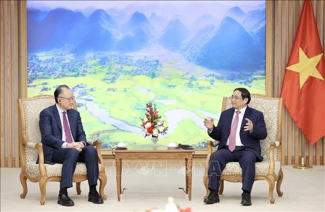 越南总理范明政会见全球基础设施基金副总裁金墉 ảnh 1 越南总理范明政会见全球基础设施基金副总裁金墉 ảnh 1