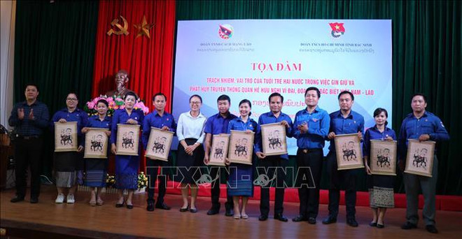 越南与老挝着力维护两国传统的特殊友谊 ảnh 2