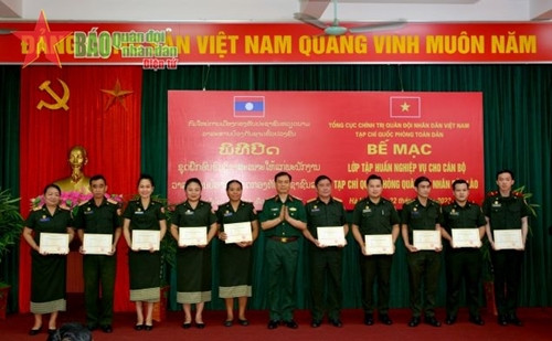 为加强越老特殊团结关系作出贡献 ảnh 1 为加强越老特殊团结关系作出贡献 ảnh 1