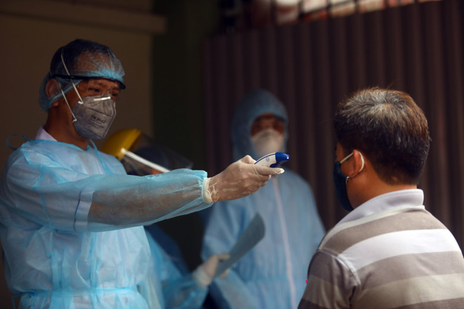 在河内各批发市场采集的1064份样本的新冠病毒快速检测结果都呈阴性 ảnh 1