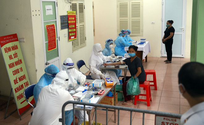 在河内各批发市场采集的1064份样本的新冠病毒快速检测结果都呈阴性 ảnh 2