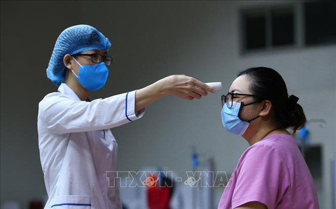 越南“不让任何人掉队”的防疫模式 ảnh 1