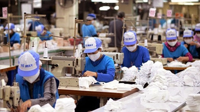 越南纺织企业承诺提供充足的抗菌布口罩 ảnh 1 越南纺织企业承诺提供充足的抗菌布口罩 ảnh 1