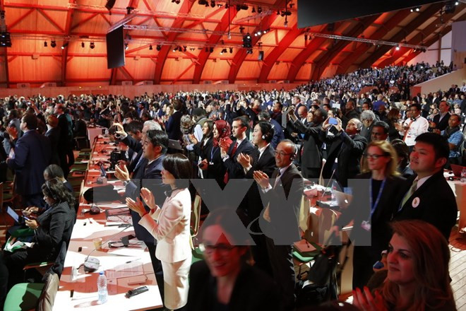 越南对COP 21通过《巴黎协定》表示欢迎 ảnh 1 越南对COP 21通过《巴黎协定》表示欢迎 ảnh 1