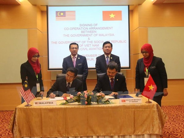越南与马来西亚签署民航领域合作协议 ảnh 1 越南与马来西亚签署民航领域合作协议 ảnh 1