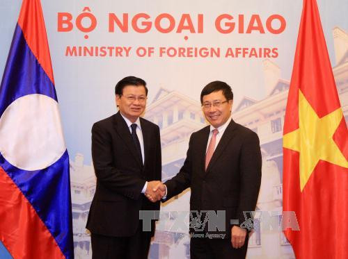 越老两国政府副总理兼外长共同主持召开第二次外长级磋商 ảnh 1 越老两国政府副总理兼外长共同主持召开第二次外长级磋商 ảnh 1