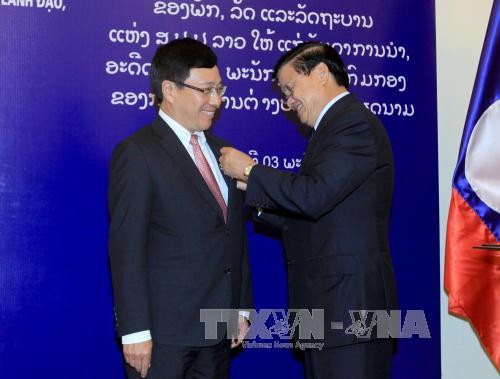 越老两国政府副总理兼外长共同主持召开第二次外长级磋商 ảnh 3 越老两国政府副总理兼外长共同主持召开第二次外长级磋商 ảnh 3