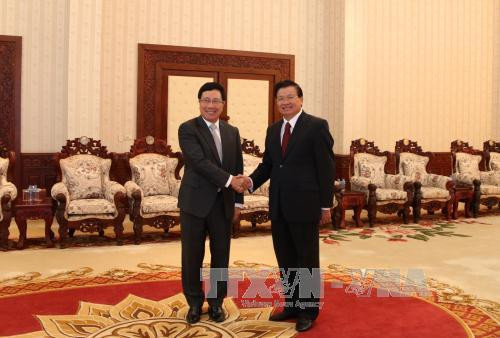 老挝领导人高度评价越老良好的合作关系 ảnh 1 老挝领导人高度评价越老良好的合作关系 ảnh 1