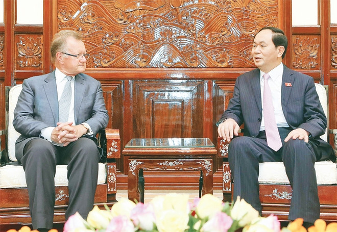 越南国家主席陈大光会见前哈佛商学院副院长约翰·奎尔奇 ảnh 1