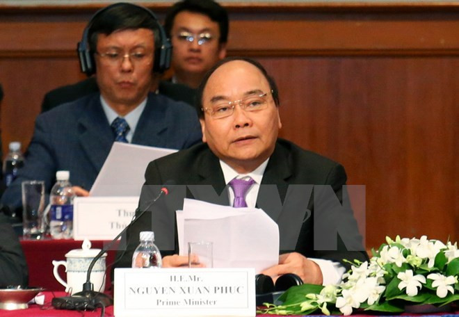 阮春福总理：国内外企业需加强交流对接 实现更强劲发展 ảnh 1