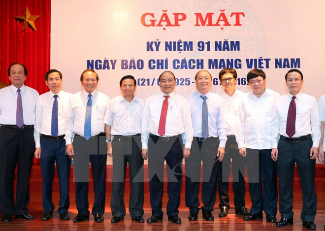 阮春福总理：新闻媒体机构应不断更新活动方式以更好地满足民众需求 ảnh 1