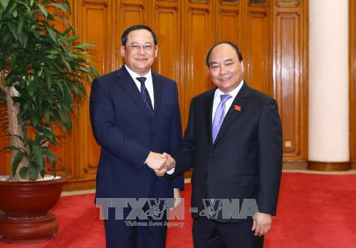 越南政府总理阮春福会见老挝政府副总理宋赛•西潘敦 ảnh 1 越南政府总理阮春福会见老挝政府副总理宋赛•西潘敦 ảnh 1