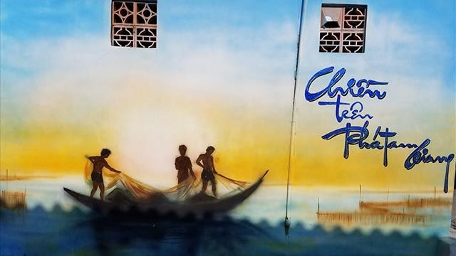 在三江泻湖区的壁画村 ảnh 1