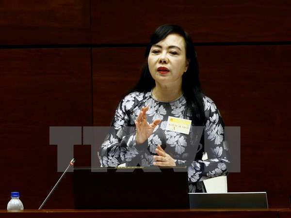 第十四届国会第三次会议：卫生部长答复代表质询 强调将着力提高基层医疗服务质量 ảnh 1
