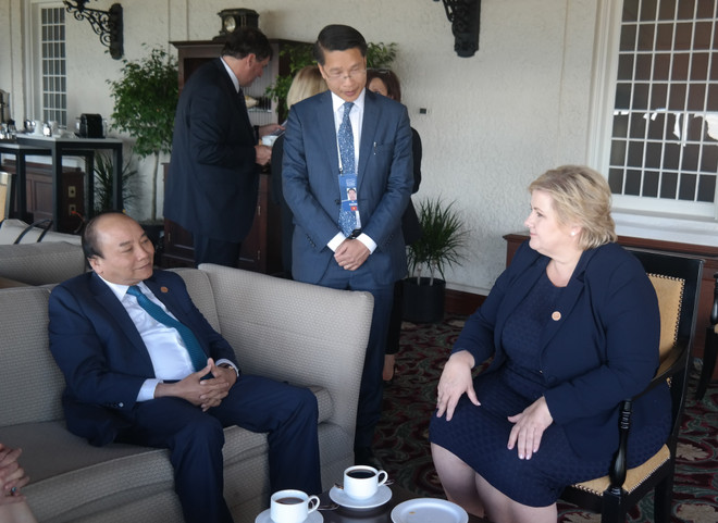 七国集团峰会扩大会议:越南政府总理阮春福开展系列双边会晤 ảnh 2 七国集团峰会扩大会议:越南政府总理阮春福开展系列双边会晤 ảnh 2