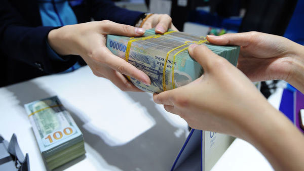 6月21日上午越盾对美元汇率中间价下调5越盾 ảnh 1