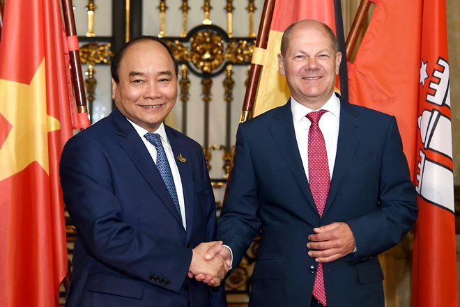 越南政府总理阮春福会见德国汉堡市市长朔尔茨 ảnh 1 越南政府总理阮春福会见德国汉堡市市长朔尔茨 ảnh 1