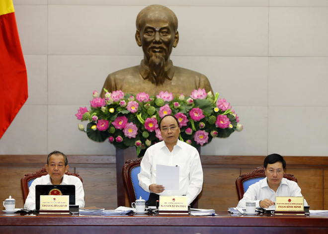 政府总理阮春福：坚定信心 努力完成2017年全年目标任务 ảnh 1