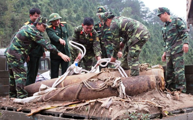 全社会携手克服战后遗留炸弹地雷后果 ảnh 1 全社会携手克服战后遗留炸弹地雷后果 ảnh 1