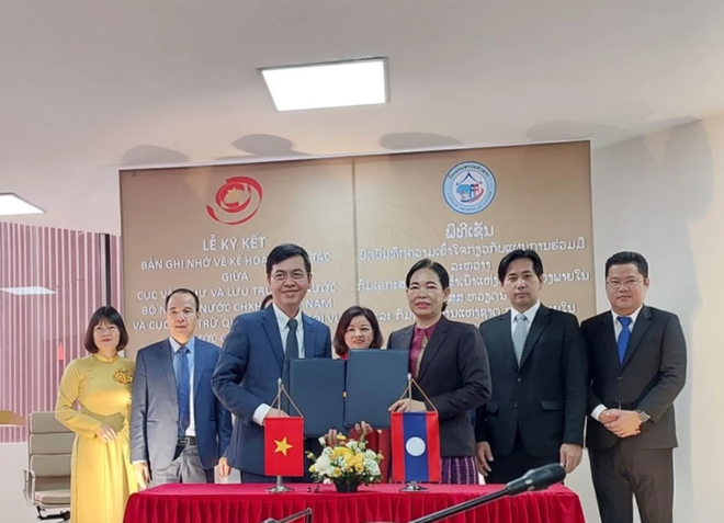 越南与老挝加强在文书档案领域的合作 ảnh 1 越南与老挝加强在文书档案领域的合作 ảnh 1