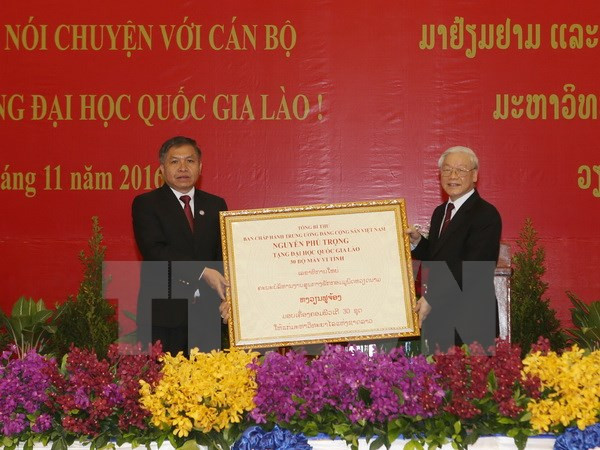 越共中央总书记阮富仲在老挝国家大学发表重要讲话 ảnh 4 越共中央总书记阮富仲在老挝国家大学发表重要讲话 ảnh 4