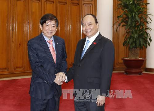 阮富仲与阮春福分别会见新加坡人民行动党主席许文远 ảnh 2 阮富仲与阮春福分别会见新加坡人民行动党主席许文远 ảnh 2