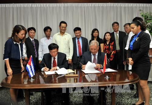 越南援助古巴大米交接仪式在哈瓦那举行 ảnh 1