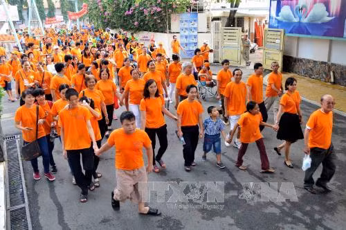 胡志明市:近8000人参加为橙毒剂受害者步行活动 ảnh 1 胡志明市:近8000人参加为橙毒剂受害者步行活动 ảnh 1