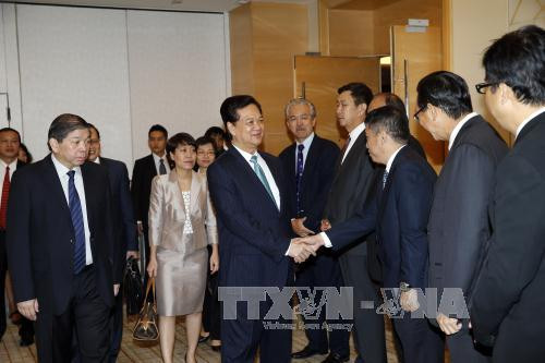 越南政府总理阮晋勇出席新加坡企业座谈会 ảnh 1 越南政府总理阮晋勇出席新加坡企业座谈会 ảnh 1