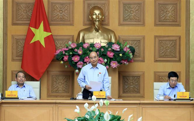 阮春福总理主持工资制度改革会议 ảnh 1