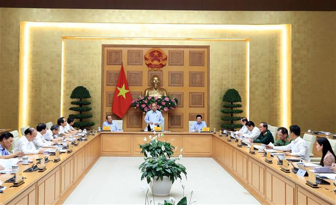 阮春福总理主持工资制度改革会议 ảnh 2