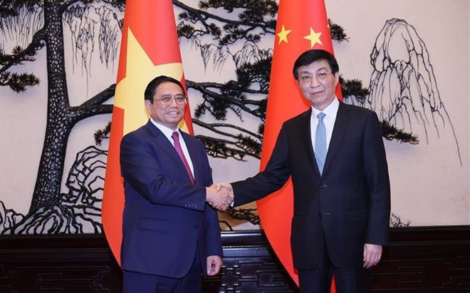 越南政府总理范明政会见中共中央政治局常委、全国政协主席王沪宁 ảnh 1 越南政府总理范明政会见中共中央政治局常委、全国政协主席王沪宁 ảnh 1