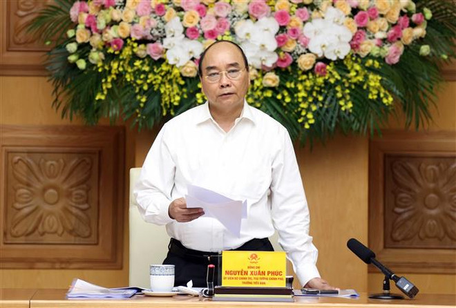 政府总理阮春福主持召开越共十三大经济社会小组第六次会议 ảnh 1