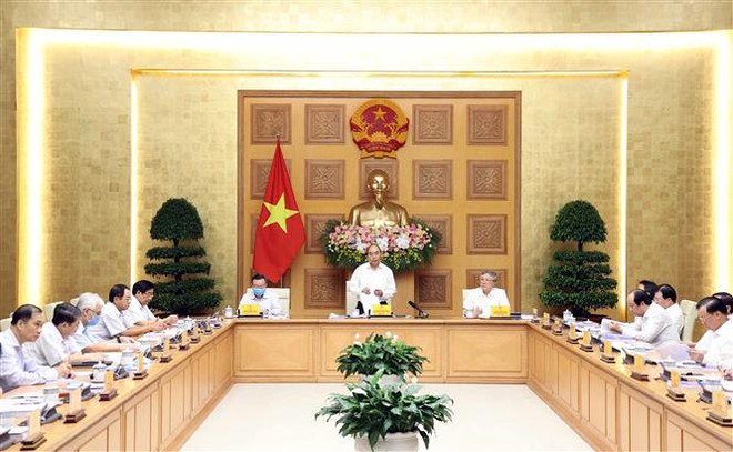 政府总理阮春福主持召开越共十三大经济社会小组第六次会议 ảnh 2