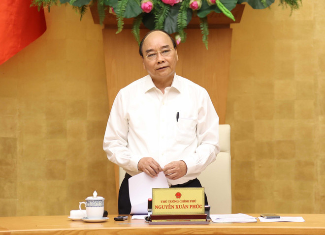 政府总理阮春福:以更加坚强的意志、更加严密的措施全面加强疫情防控工作 ảnh 1 政府总理阮春福:以更加坚强的意志、更加严密的措施全面加强疫情防控工作 ảnh 1