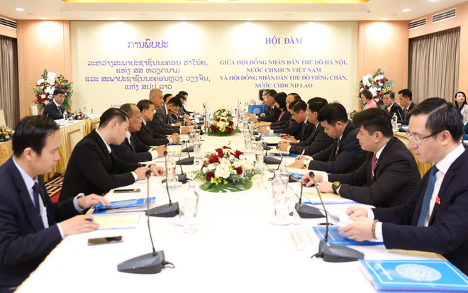 河内与万象开展民选机构运作经验交流 ảnh 1