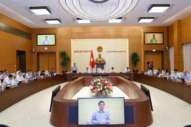 会议场景 图自越通社 法律专题会议:确保有关消费者保护法规的兼容性和一致性 ảnh 1