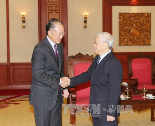 越共中央总书记阮富仲会见世界银行行长金墉 ảnh 1 越共中央总书记阮富仲会见世界银行行长金墉 ảnh 1