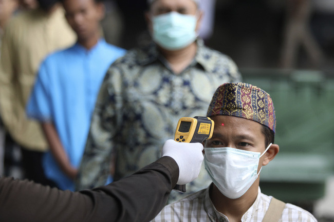 新冠肺炎确诊病例：印尼和马来西亚的新冠肺炎确诊病例突增 ảnh 1