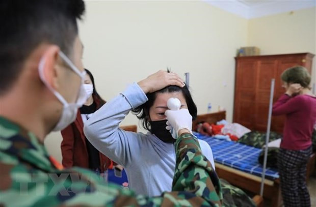 越南第123例确诊病例是一名从马来西亚回来的女性 ảnh 1