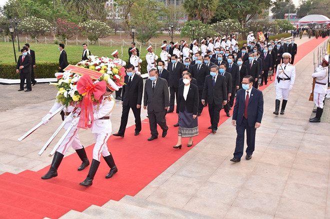 老挝各地纷纷举行老挝人民革命党建党65周年纪念活动 ảnh 1 老挝各地纷纷举行老挝人民革命党建党65周年纪念活动 ảnh 1