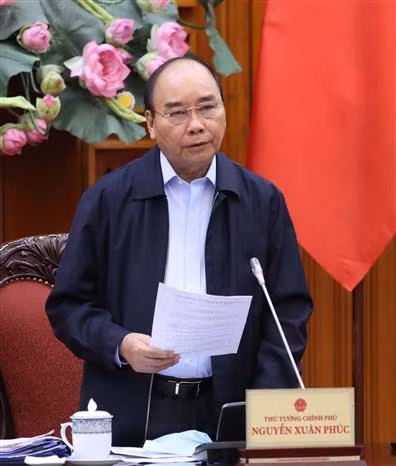 越南政府总理阮春福致信赞扬军队和公安力量在新冠肺炎疫情防控工作中的努力和贡献 ảnh 1