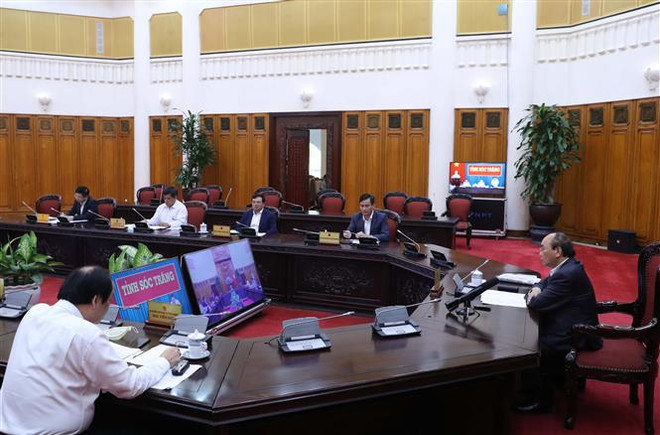 政府总理阮春福与朔庄省主要领导举行视频会议 ảnh 1 政府总理阮春福与朔庄省主要领导举行视频会议 ảnh 1