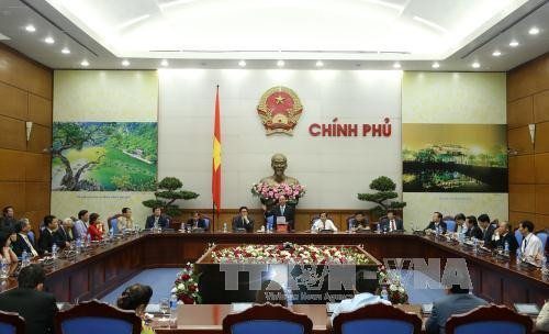 阮春福总理：新闻媒体应参与协助并为企业发展创造条件 ảnh 1