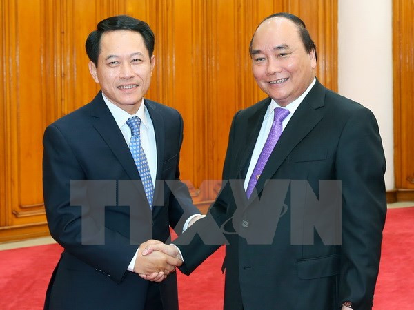 越南政府总理阮春福会见老挝外长 ảnh 1 越南政府总理阮春福会见老挝外长 ảnh 1