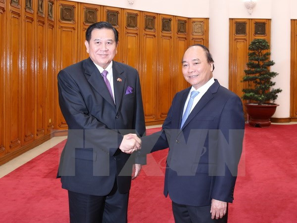 越南政府总理阮春福会见泰国副总理塔纳萨 ảnh 1 越南政府总理阮春福会见泰国副总理塔纳萨 ảnh 1