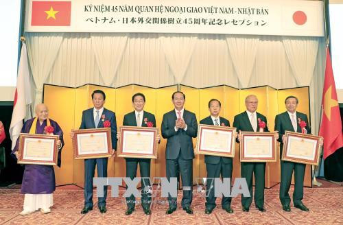 越南国家主席陈大光出席越日建交45周年纪念典礼 ảnh 2 越南国家主席陈大光出席越日建交45周年纪念典礼 ảnh 2